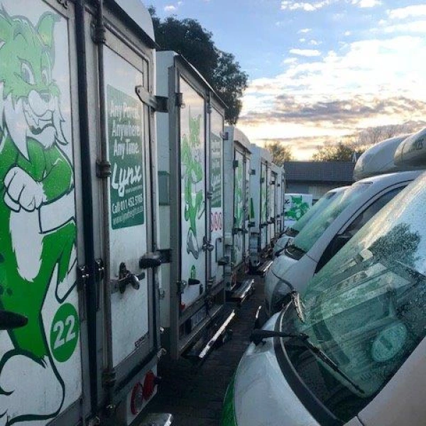 Multiple Lynx trucks and delivery fans